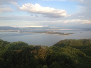View from the top of Shikonoshima of the spit below connecting it to the city