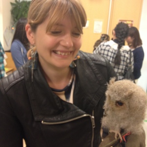 Me with the little baby owl, only one month old!! He nibbles so you have to wear a glove!